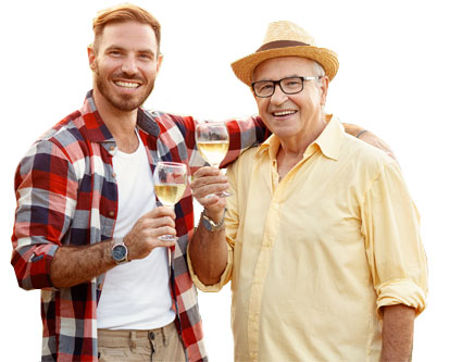 Father and son toasting wine in wine country, western slope Colorado.